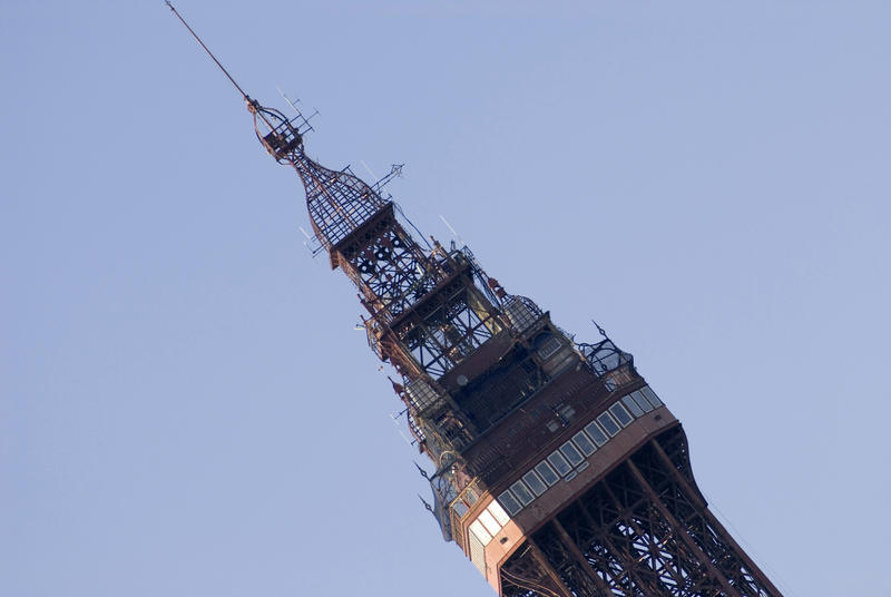 Angled view of the ornate Victorian architecture at the top of the Blackpool Tower, Blackpool, Lancashire, England