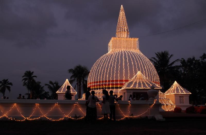 <p>Lights</p>Buddhist temple illuminated at night, Kelaniya Srilanka