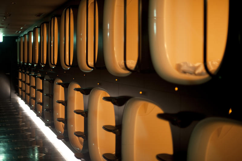 bedroom pods in a Japanese capsule hotel interior