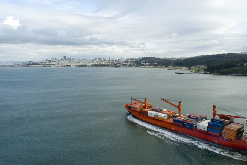 Loaded container ship bringing imported products to san francisco or oakland