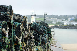7287   Lobster pots in St Ives harbour