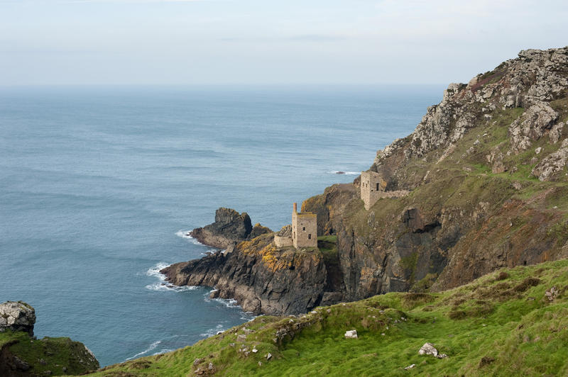 The two ruined engine houses at Crown Mines, Cornwall on the cliffs overlooking the Atlantic Ocean