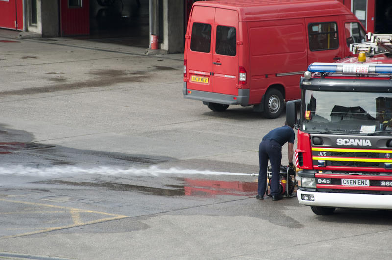 testing emergency equipment at a fire station - not model released