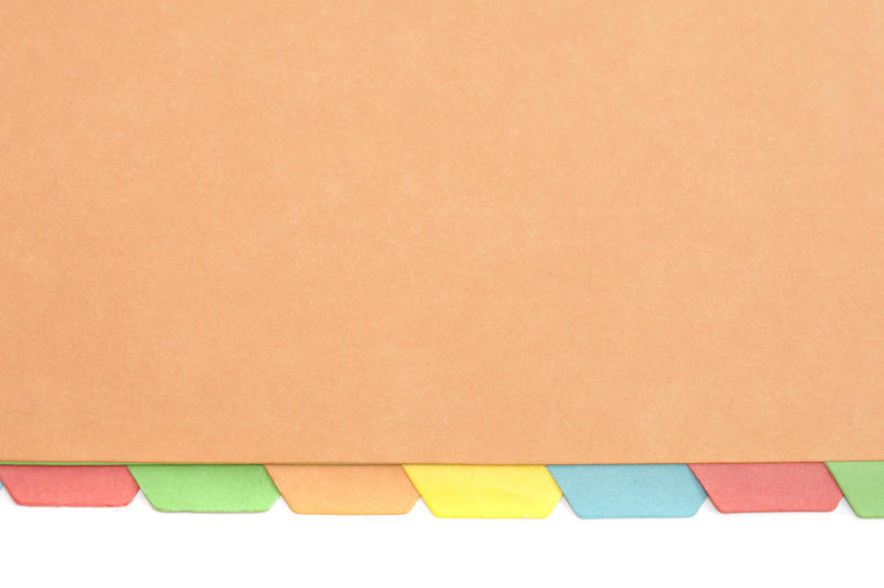 Blank folder with multicoloured index tabs at the bottom ready for your header or text