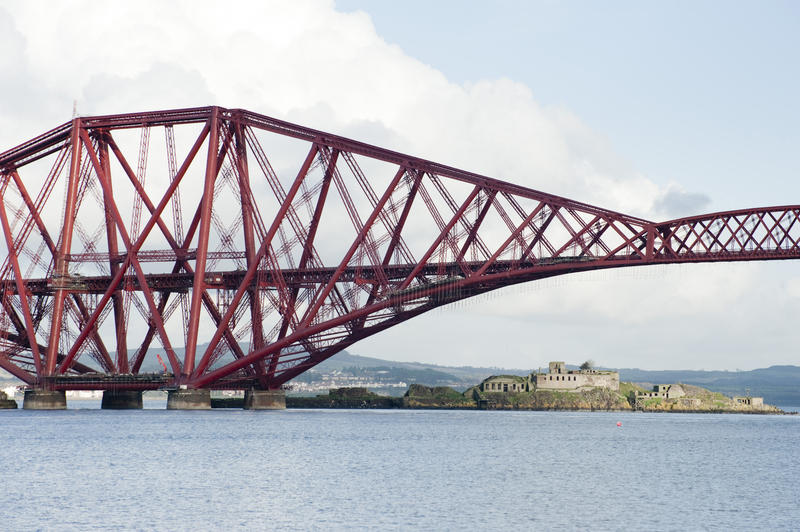the forth bridge and the island of inchgravie on the middle of the firth of forth