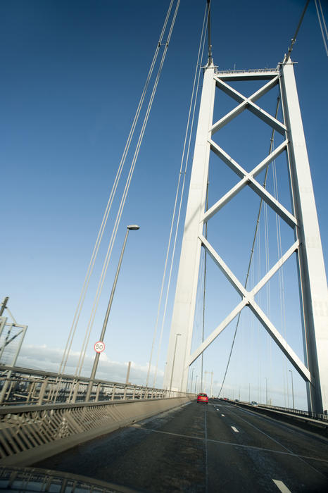 Driving over the Forth Road Bridge, a suspension bridge over the Firth of Forth, Edinburgh, Scotland