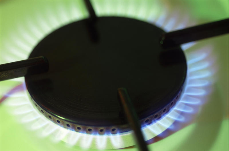 bright blue flames from a domestic cooker gas burner