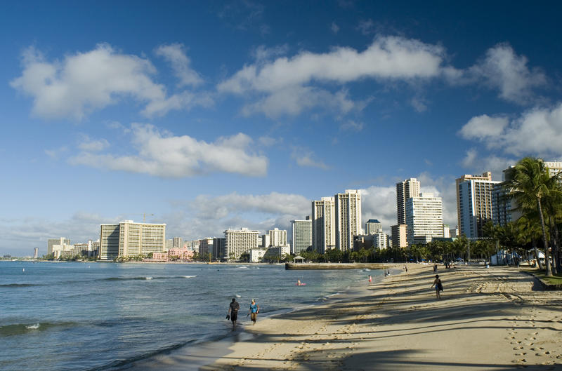 sunny day on the beach in a holiday paradise, waikiki beach honolulu, hawaii