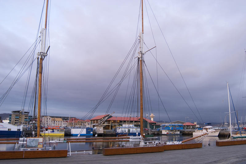 masts of a wooden boat berthed in constitution dock, hobart, tasmania