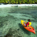 6300   Kayaker on crystal clear tropical water