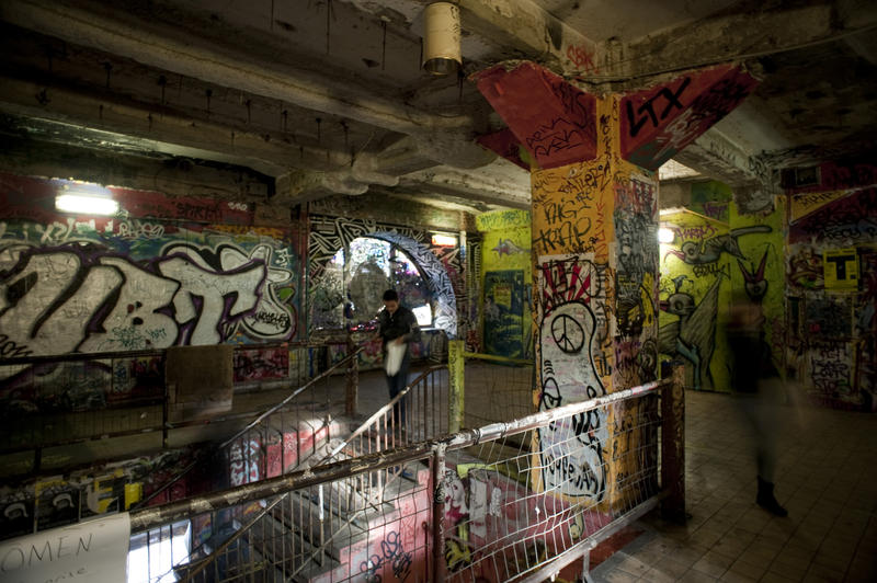 Interior of the Kunsthaus Tacheles a former art squat in Berlin showing the contemporary art and graffiti that lined the walls and staircase