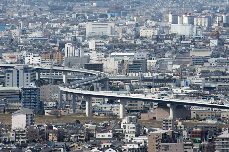 looking out across the urban sprawl of the city of kyoto from funari hill