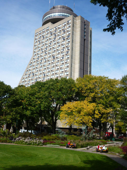 View from the landscape gardens of the Loews de Concord Hotel, Quebec against blue hazy sky