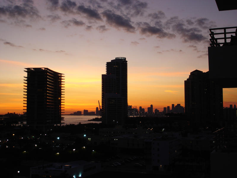 sunset over the appartment towers of miami