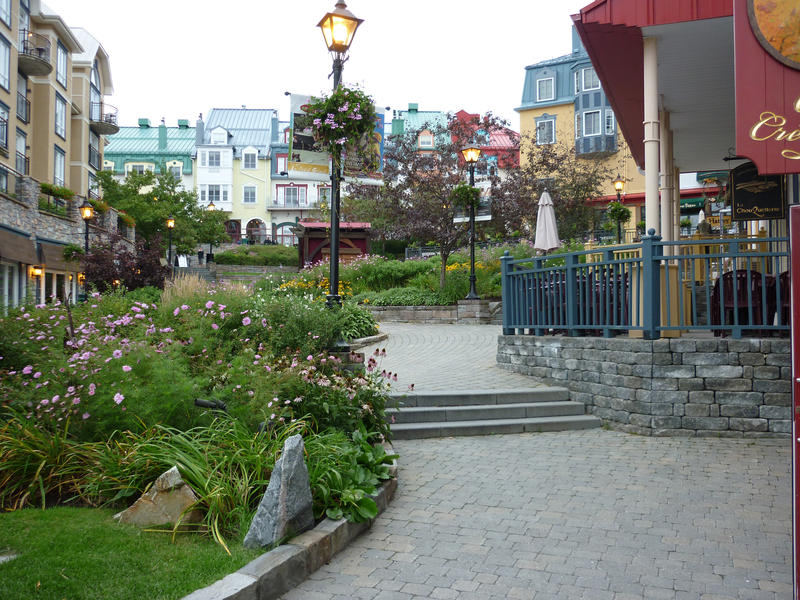 View along a winding walkway of the picturesque architecture of Mont Tremblant village in the Laurentian mountains near Montreal, Quebec