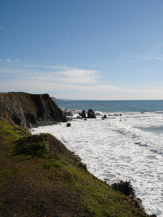 pacific waves breaking on the rocky california coastline