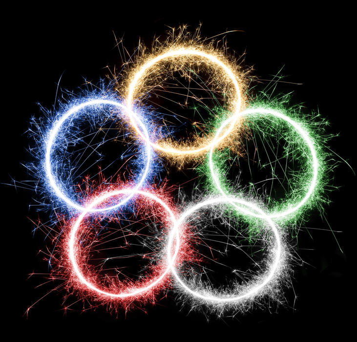 overlapping rings of fireworks sparkles