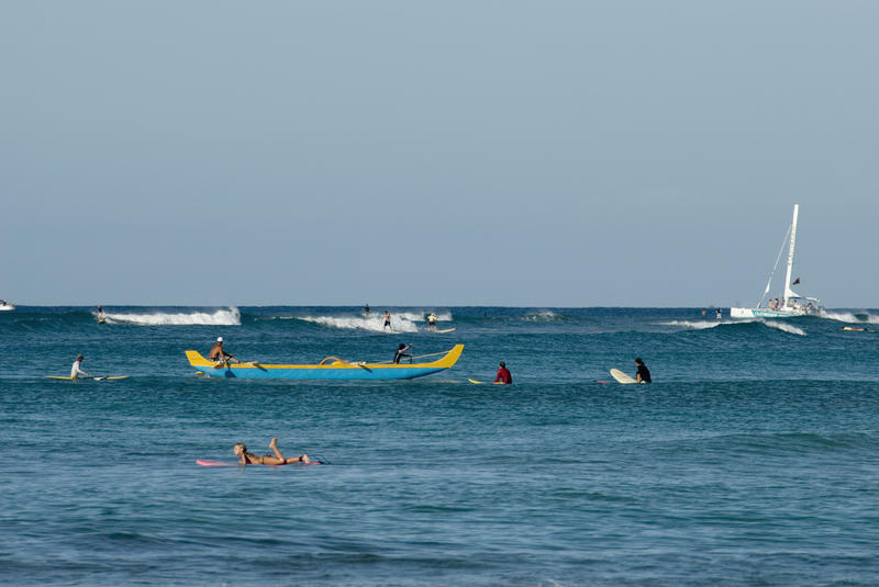 outrigger canoe in the surf at waikiki beach