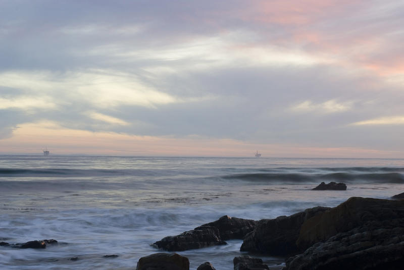 sunset from refugio, orange sky and offshore oil platforms