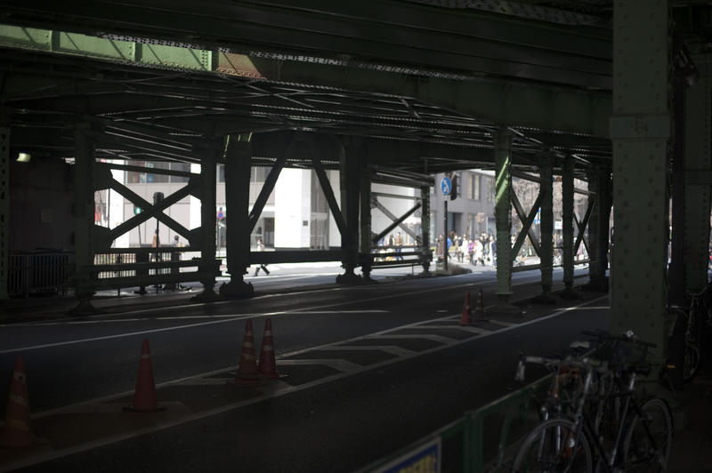 underneath a metal railway bridge, ginza, tokyo