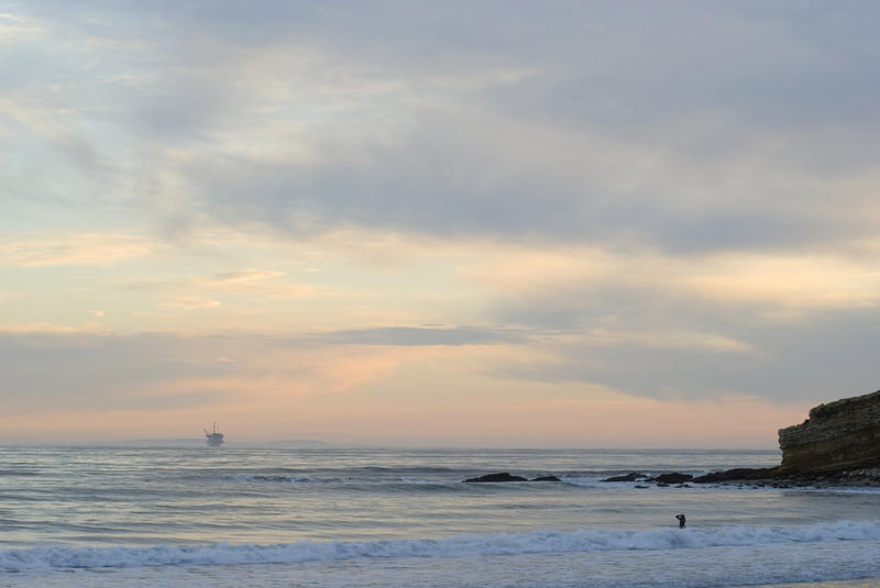 sunset from refugio, orange sky and offshore oil platforms