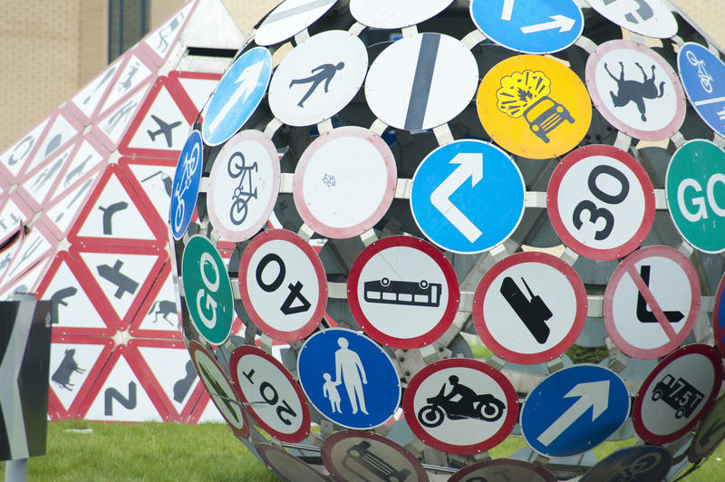 The Magic Roundabout in Splott, Cardiff, Wales with its unusual modern roadsign sculptures by Pierre Vivant