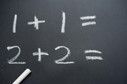 7026   Basic sums on a blackboard