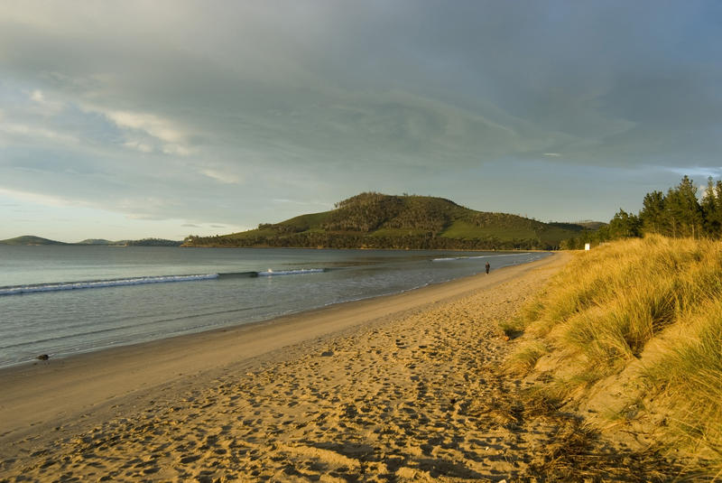 sunset over 7 mile beach near hobart, tasmania