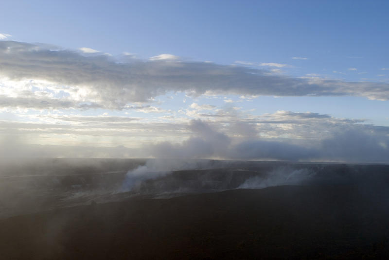 smoke, steam and volcanic gas rising from the kilauea caldera, big island hawaii