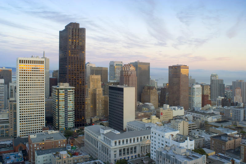 sunset over the buildings of downtown san francisco