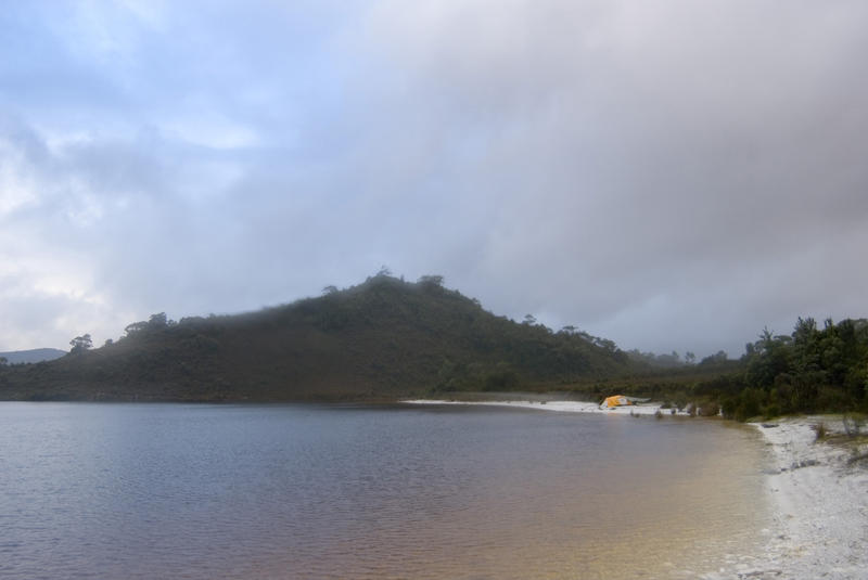 camping on the shores of lake pedder at teds beach