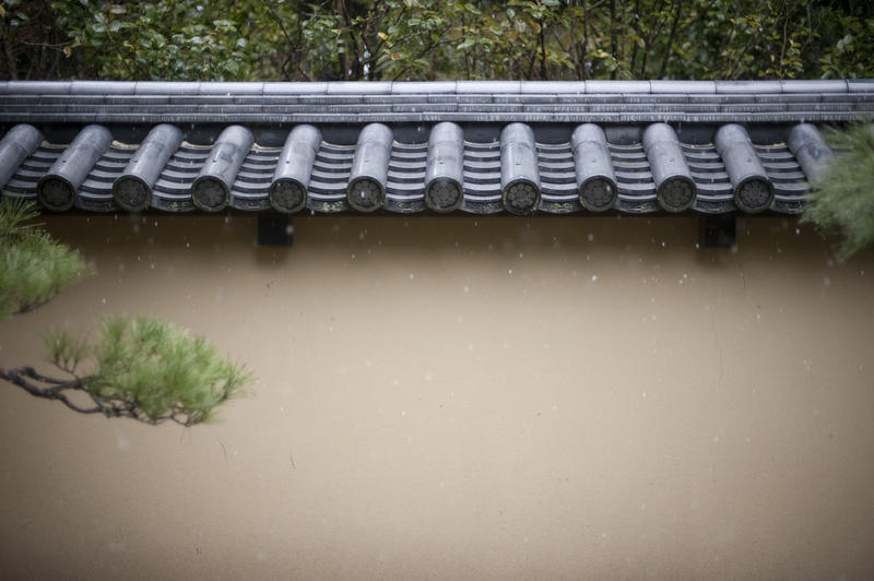 tiled coping on top of a wall at a Japanese temple, Kyoto, Japan, copyspace