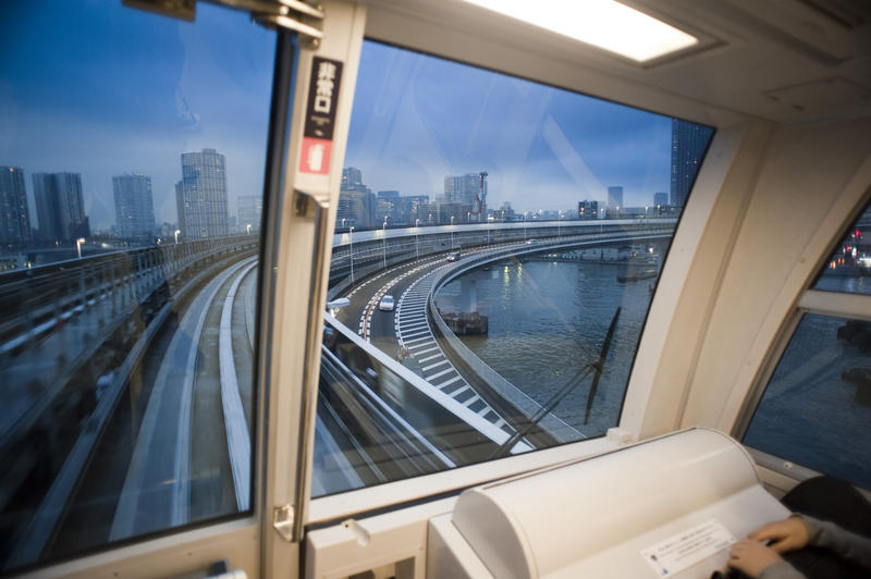 view from a tokyo light rail trainsit train