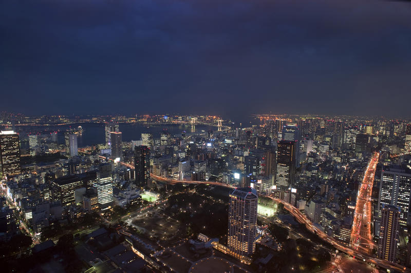 looking south towards odiaba the docklands area and the rainbow bridge at night from the Tokyo tv tower, Japan