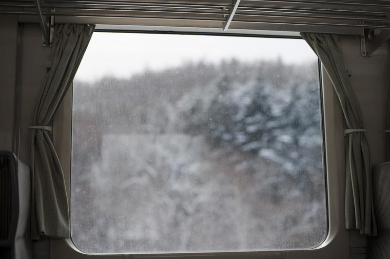 view of a train window with plenty of space for text to be added