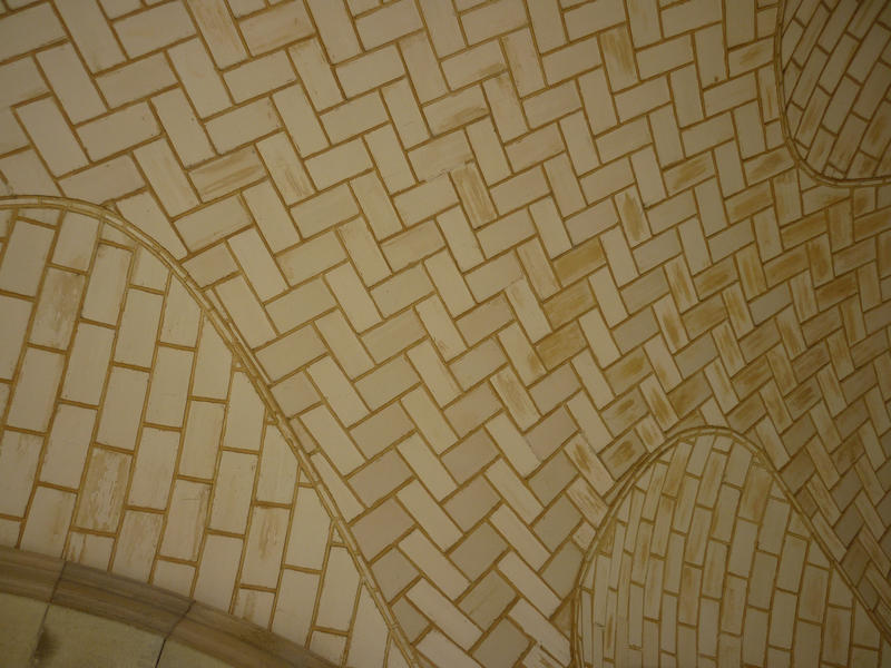 Abstract architectural background of a vaulted interior ceiling with a geometric pattern of staggered rectangles