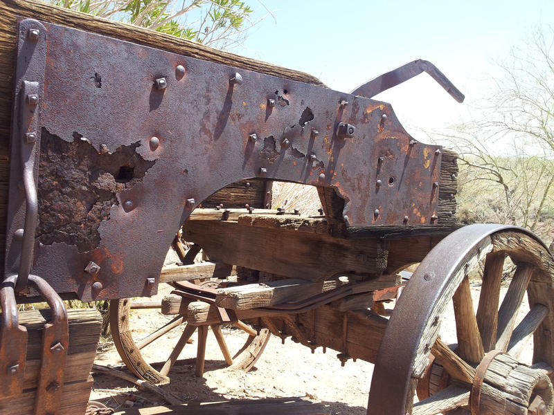 <p>Rusted wagon in the desert.</p>