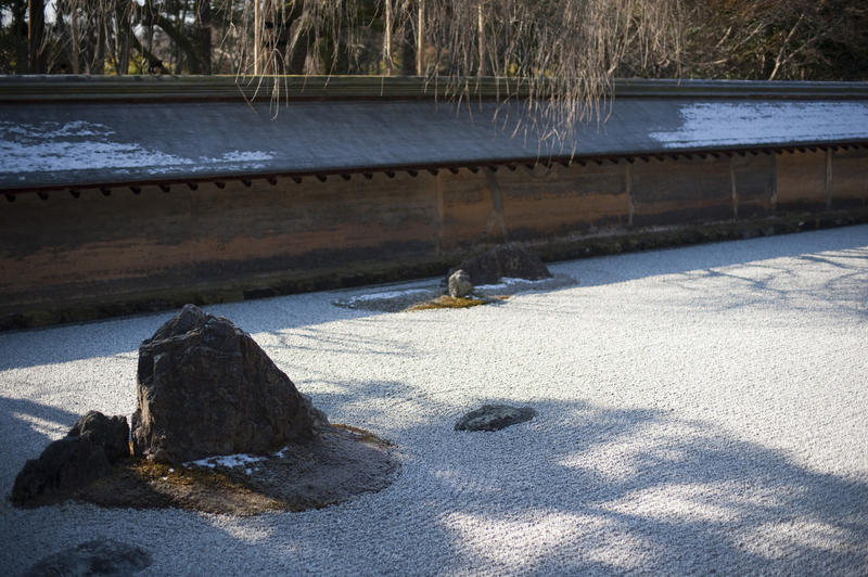 a karesansui (zen dry landscape) rock garden at Ryoan-ji, Kyoto, Japan