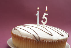 11424   Iced 15th Birthday cake with candles