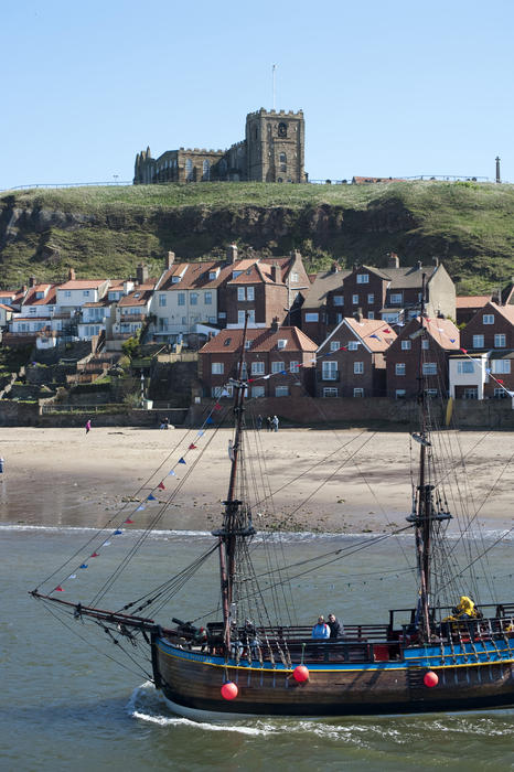 Full sized scale model replica of Captain Cooks ship, the Bark Endeavour, which sails the Yorkshire coast from Whitby taking tourists on sightseeing trips