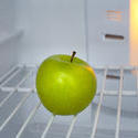 8220   Green apple in an empty fridge