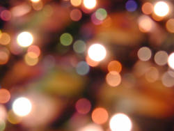 11560   Festive background bokeh of sparkling party lights