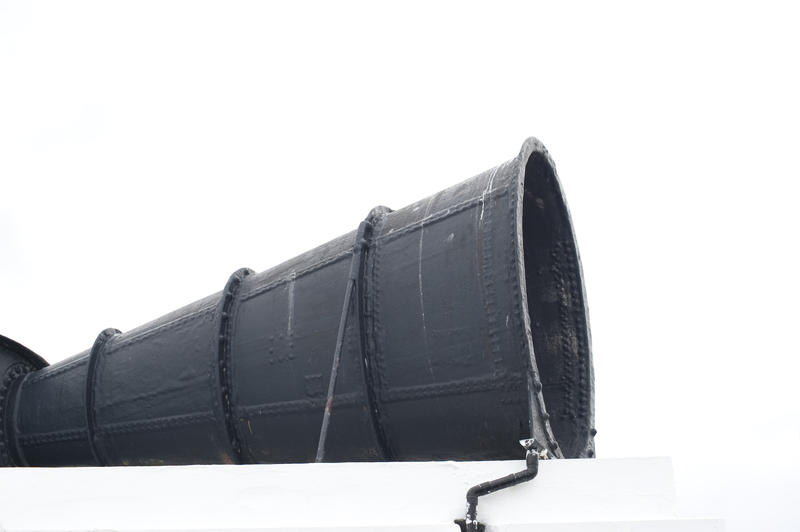 Single big fog horn at Whitby South Lighthouse for warning ships of impending danger or natural hazards in the ocean during reduced visibility caused by fog and sea mists