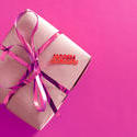 11432   Pink gift tied with a decorative bow