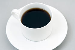11611   Cup of black coffee on saucer