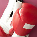 10979   Close up Boxing Gloves on Dark Pink Background