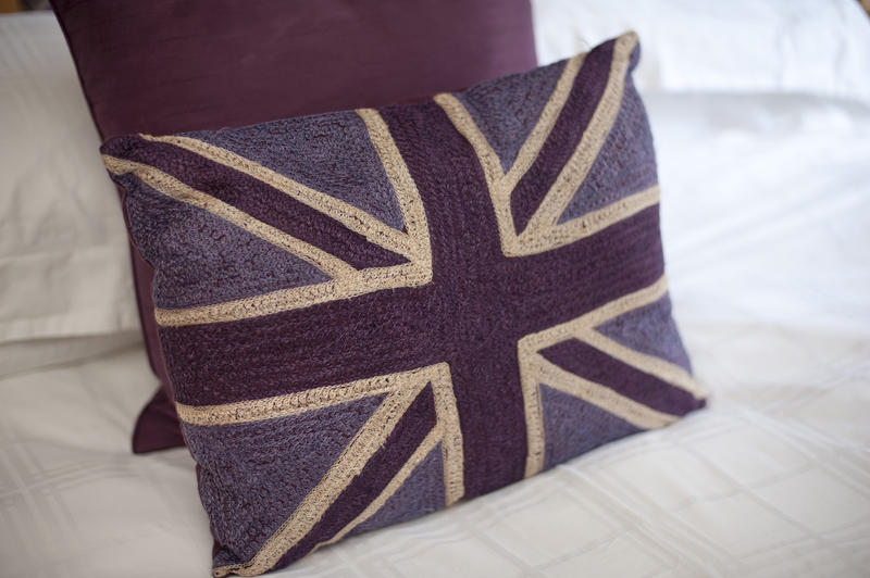British themed bedroom decor with a pillow cover in the form of the Union Jack or Union flag of the Untied Kingdom