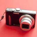 stock image 10670   Digital Camera Isolated on Red Background