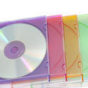 11095   Pile of Colorful CD Cases on White Background