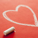 stock image 11534   White Chalk Beside Heart Drawn on Red Background